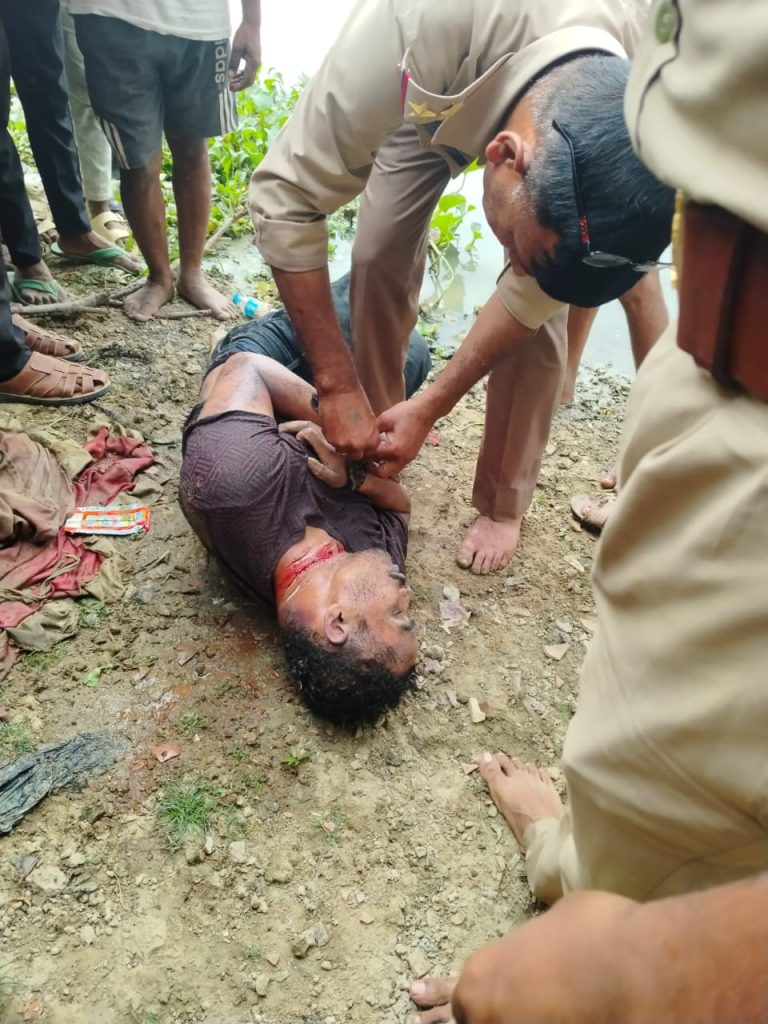 आमी नदी किनारे युवक की गला रेतकर हत्या, हाथ-पैर बांधकर फेंका शव।